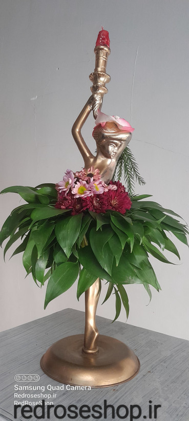 دیزاین شمعدان با گل