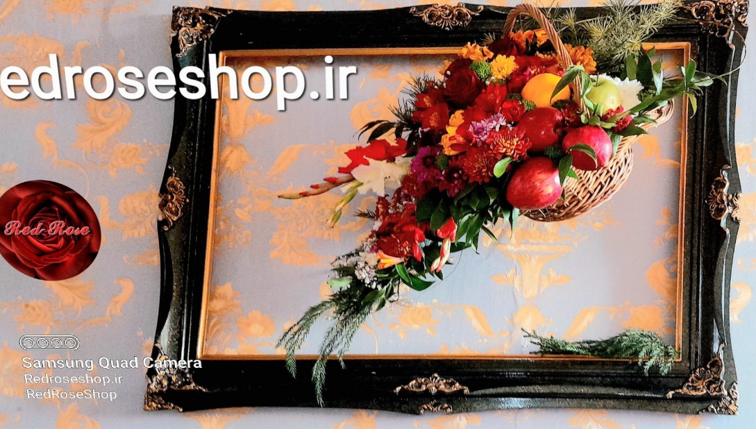 ‪سبد-گل-آبشاری-قاب-دیوار-با-گلهای-رنگارنگ-میوه-یلدا